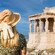 A woman admiring the Caryatid porch of the Erechtheion in Athens, Greece